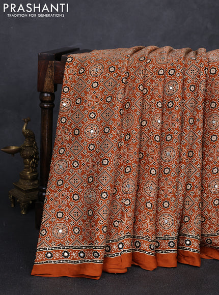 Modal silk saree dark mustard with allover ajrakh prints and mirror & sequin embroidery pallu