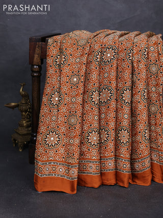 Modal silk saree dark mustard with allover ajrakh prints and mirror & sequin embroidery pallu