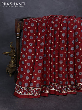 Modal silk saree maroon with allover ajrakh prints and mirror & sequin embroidery pallu