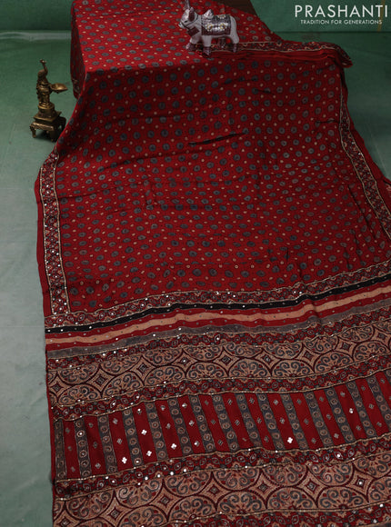 Modal silk saree maroon with allover ajrakh prints and mirror & sequin embroidery pallu