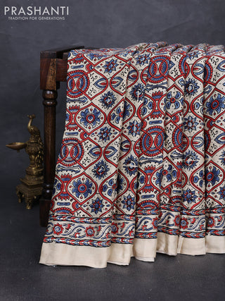 Modal silk saree cream with allover ajrakh prints and mirror & sequin embroidery pallu