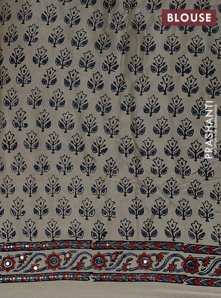 Modal silk saree cream with allover ajrakh prints and mirror & sequin embroidery pallu