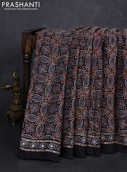 Modal silk saree black with allover ajrakh prints and mirror & sequin embroidery pallu