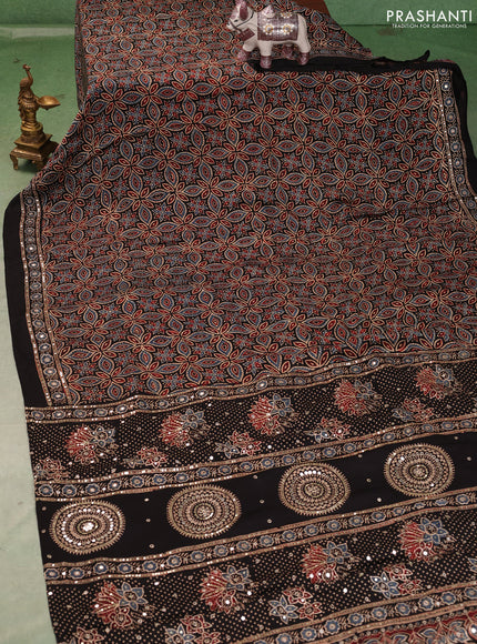 Modal silk saree black with allover ajrakh prints and mirror & sequin embroidery pallu