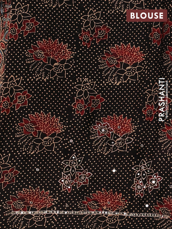 Modal silk saree black with allover ajrakh prints and mirror & sequin embroidery pallu