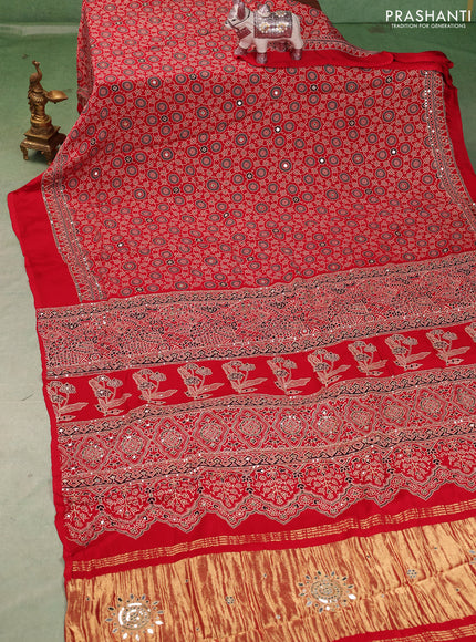 Modal silk saree red with allover ajrakh prints and mirror & sequin embroidery pallu