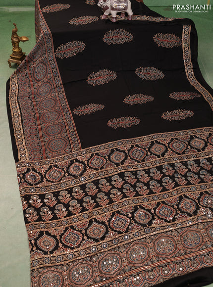 Modal silk saree black with allover ajrakh prints and mirror & sequin embroidery pallu