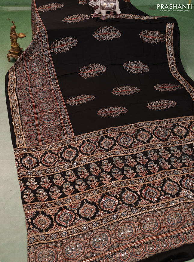 Modal silk saree black with allover ajrakh prints and mirror & sequin embroidery pallu