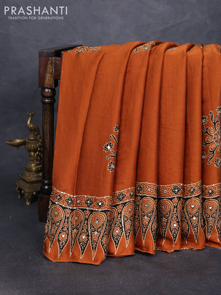 Modal silk saree dark mustard with ajrakh butta prints and mirror & sequin embroidery pallu