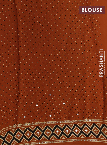 Modal silk saree dark mustard with ajrakh butta prints and mirror & sequin embroidery pallu