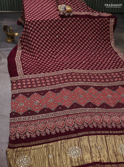 Modal silk saree wine shade with allover ajrakh prints and mirror & sequin embroidery pallu