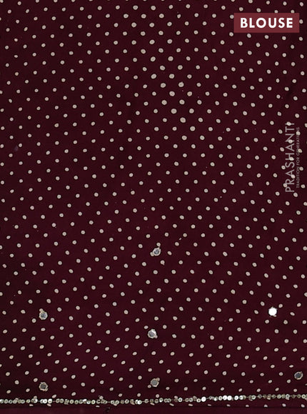 Modal silk saree wine shade with allover ajrakh prints and mirror & sequin embroidery pallu
