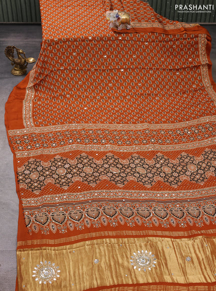 Modal silk saree dark mustard with allover ajrakh prints and mirror & sequin embroidery pallu