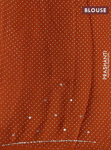 Modal silk saree dark mustard with allover ajrakh prints and mirror & sequin embroidery pallu
