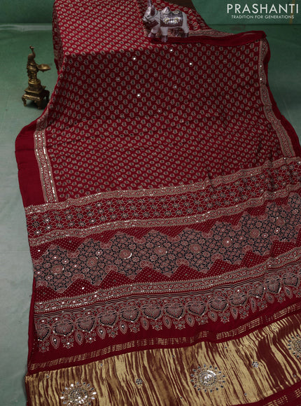 Modal silk saree tomato red with allover ajrakh prints and mirror & sequin embroidery pallu