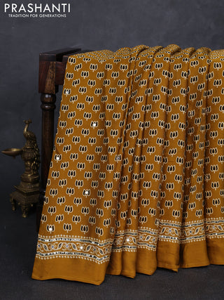 Modal silk saree mustard yellow with allover ajrakh prints and mirror & sequin embroidery pallu