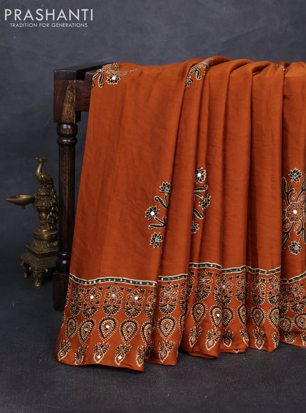 Modal silk saree rustic orange with allover ajrakh prints and mirror & sequin embroidery pallu