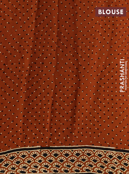 Modal silk saree rustic orange with allover ajrakh prints and mirror & sequin embroidery pallu