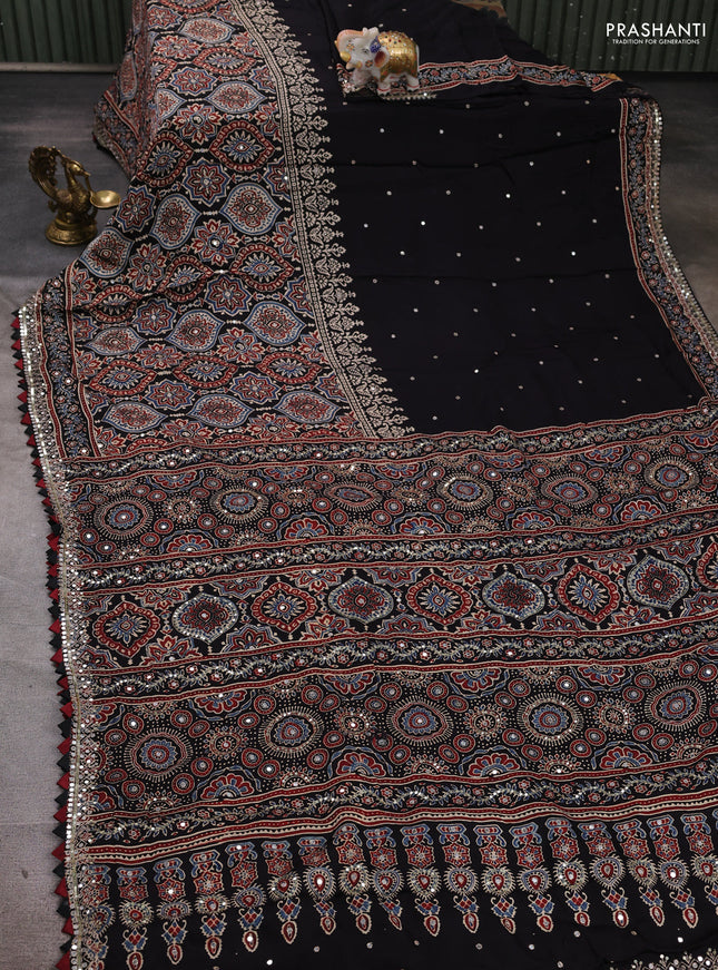 Modal silk saree black with mirror work & ajrakh prints and mirror & sequin embroidery pallu
