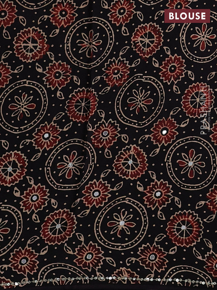 Modal silk saree black with allover ajrakh prints and mirror & sequin embroidery pallu