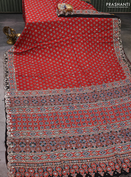 Modal silk saree maroon with allover ajrakh prints and mirror & sequin embroidery pallu