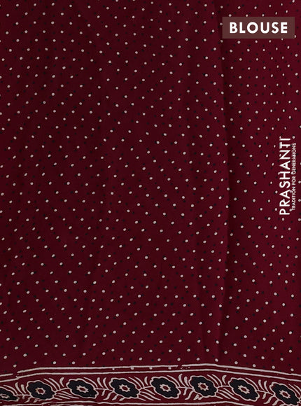 Modal silk saree maroon with ajrakh butta prints and mirror & sequin embroidery pallu