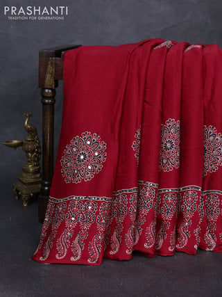Modal silk saree red with ajrakh butta prints and mirror & sequin embroidery pallu