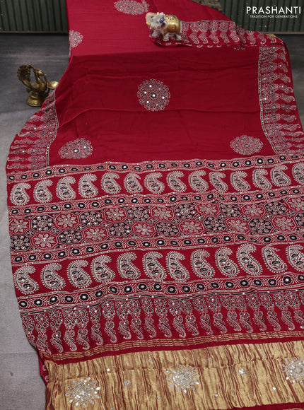 Modal silk saree red with ajrakh butta prints and mirror & sequin embroidery pallu