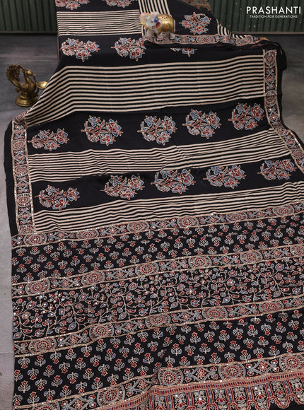 Modal silk saree black with ajrakh butta prints and mirror & sequin embroidery pallu