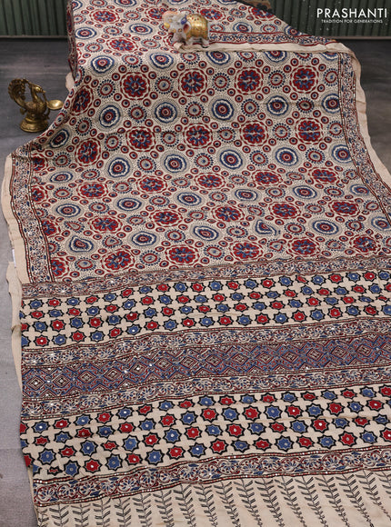 Modal silk saree beige with allover ajrakh prints and mirror & sequin embroidery pallu