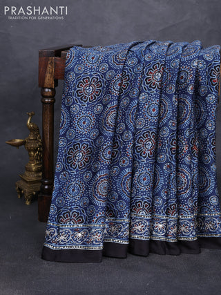 Modal silk saree indigo blue and black with allover ajrakh prints and mirror & sequin embroidery pallu