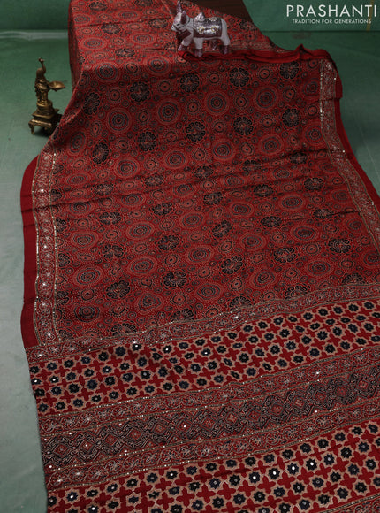Modal silk saree rustic orange with allover ajrakh prints and mirror & sequin embroidery pallu