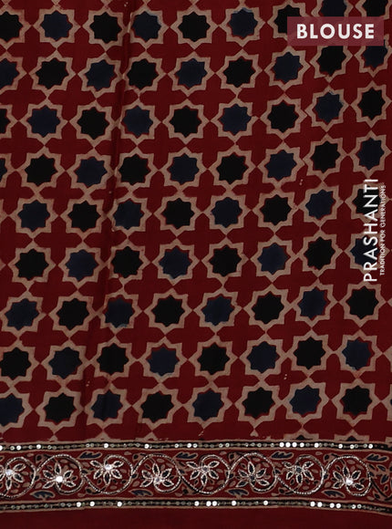 Modal silk saree rustic orange with allover ajrakh prints and mirror & sequin embroidery pallu
