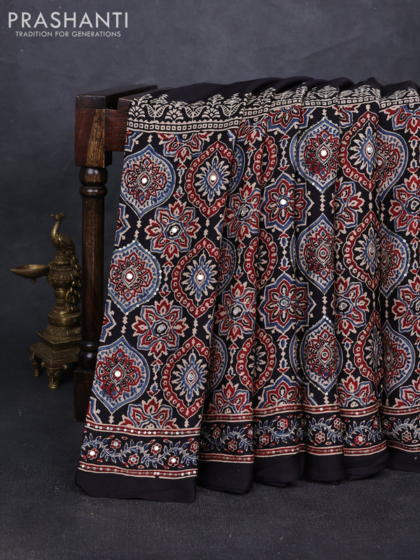 Modal silk saree black with allover ajrakh prints and mirror & sequin embroidery pallu