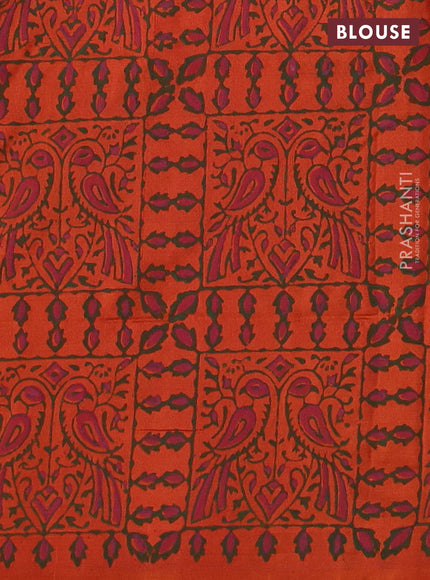 Uppada block printed silk saree rustic orange with butta prints and printed border