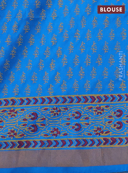 Uppada block printed silk saree cream and cs blue with butta prints and zari woven border