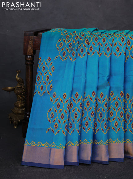 Uppada block printed silk saree cs blue and coffee brown with allover prints and zari woven border