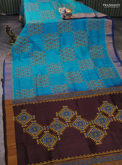 Uppada block printed silk saree cs blue and coffee brown with allover prints and zari woven border