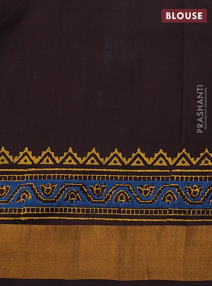 Uppada block printed silk saree cs blue and coffee brown with allover prints and zari woven border