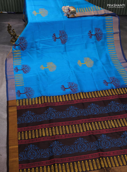 Uppada block printed silk saree cs blue and coffee brown with tree butta prints and zari woven border
