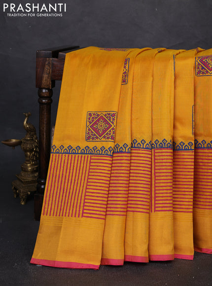 Uppada block printed silk saree mango yellow and pink with butta prints and long printed zari woven border
