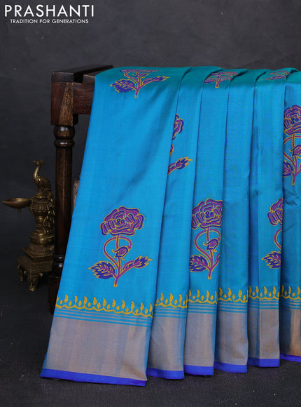 Uppada block printed silk saree dual shade of teal blue and royal blue with floral butta prints and zari woven border