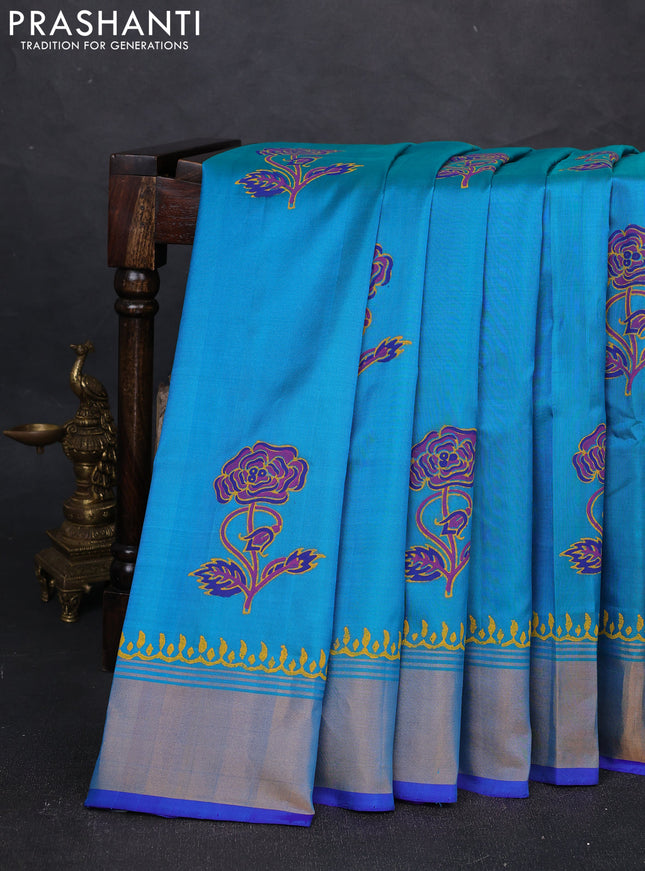 Uppada block printed silk saree dual shade of teal blue and royal blue with floral butta prints and zari woven border