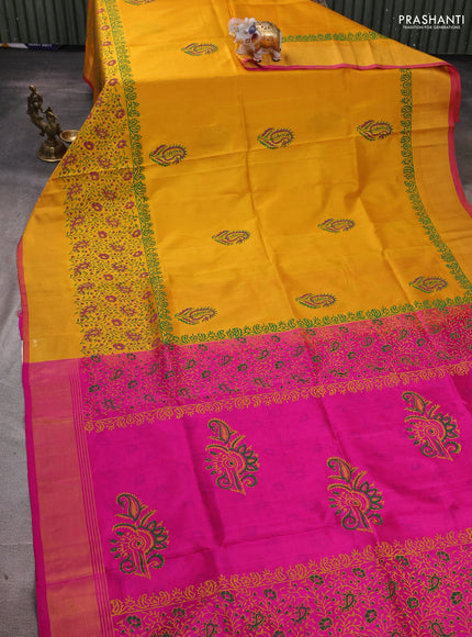 Uppada block printed silk saree yellow and pink with butta prints and long printed zari woven border