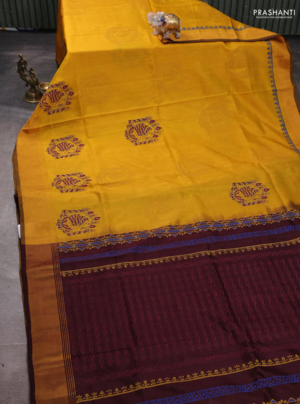 Uppada block printed silk saree mustard yellow and coffee brown with butta prints and zari woven border