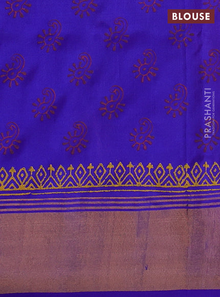 Uppada block printed silk saree dual shade of pinkish orange with butta prints and zari woven border