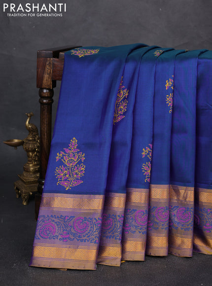 Uppada block printed silk saree dual shade of bluish green and dual shade of dark mustard with butta prints and zari woven printed border