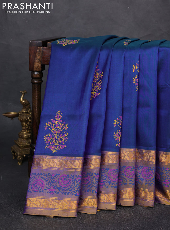 Uppada block printed silk saree dual shade of bluish green and dual shade of dark mustard with butta prints and zari woven printed border
