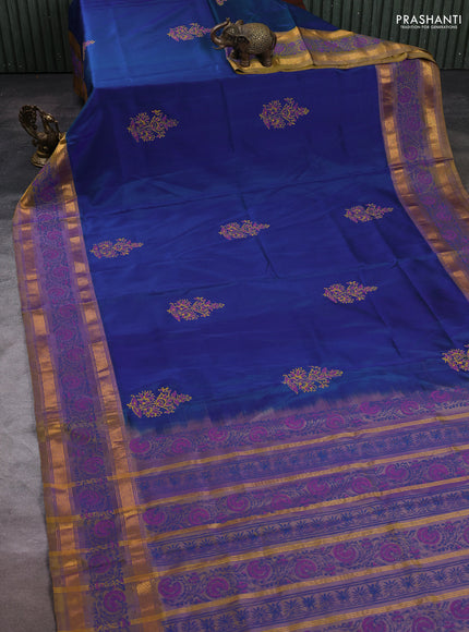 Uppada block printed silk saree dual shade of bluish green and dual shade of dark mustard with butta prints and zari woven printed border