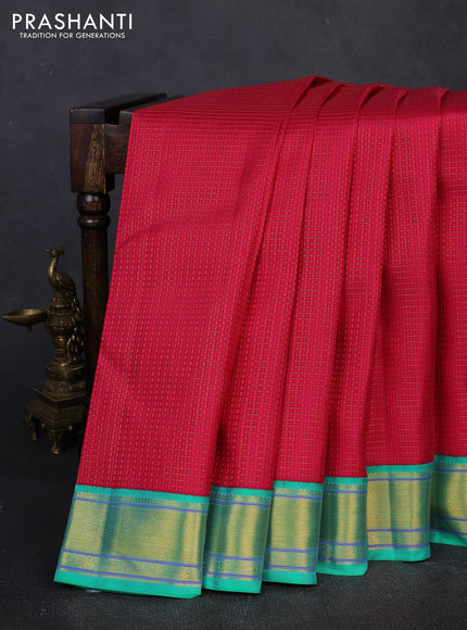 Pure kanchipuram silk saree pink and teal green with allover zari checks & self emboss and zari woven border